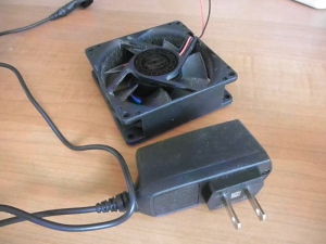 Computer cooling fan and cell phone charger